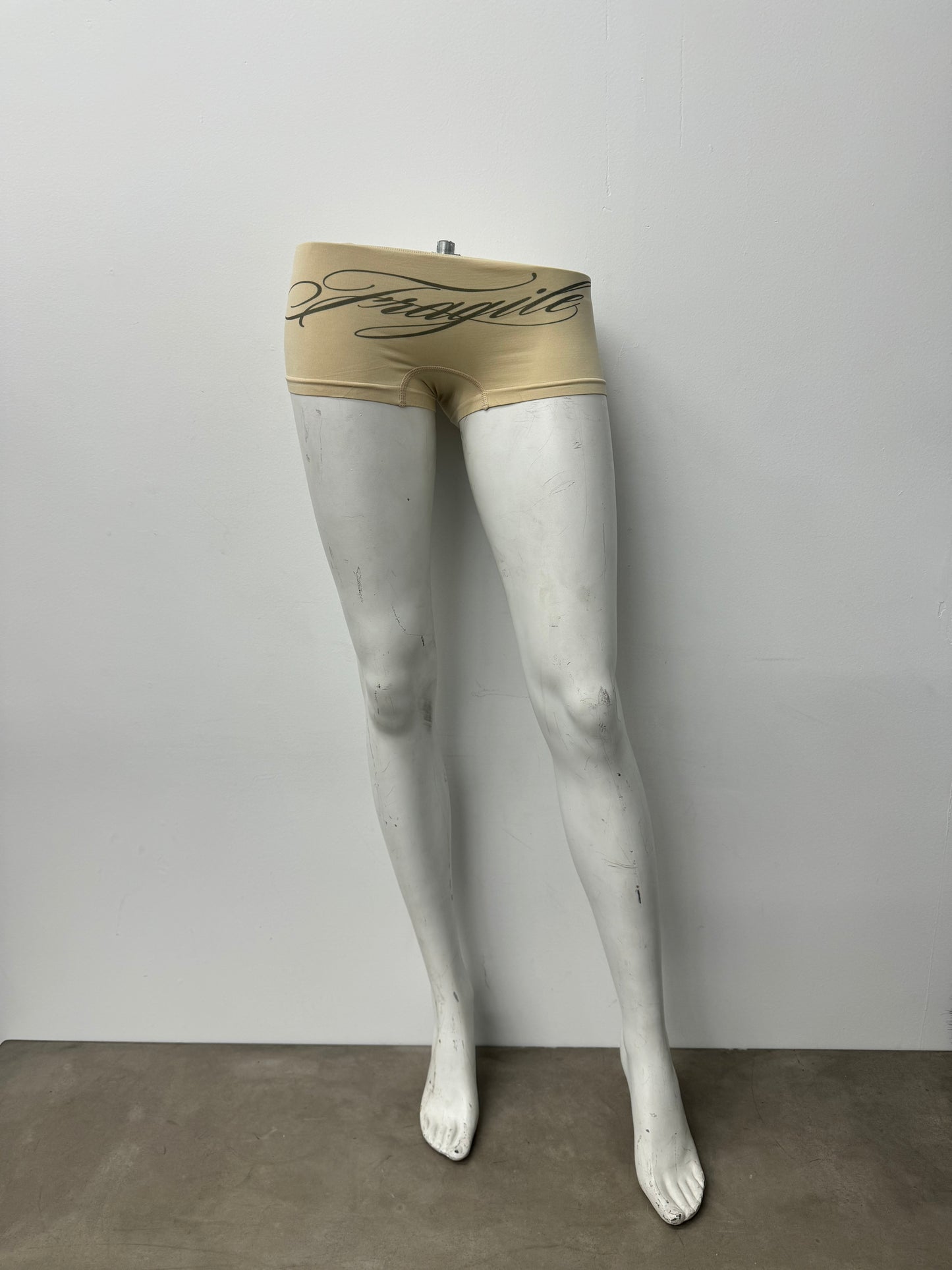 Fragile Tan Mini Shorts