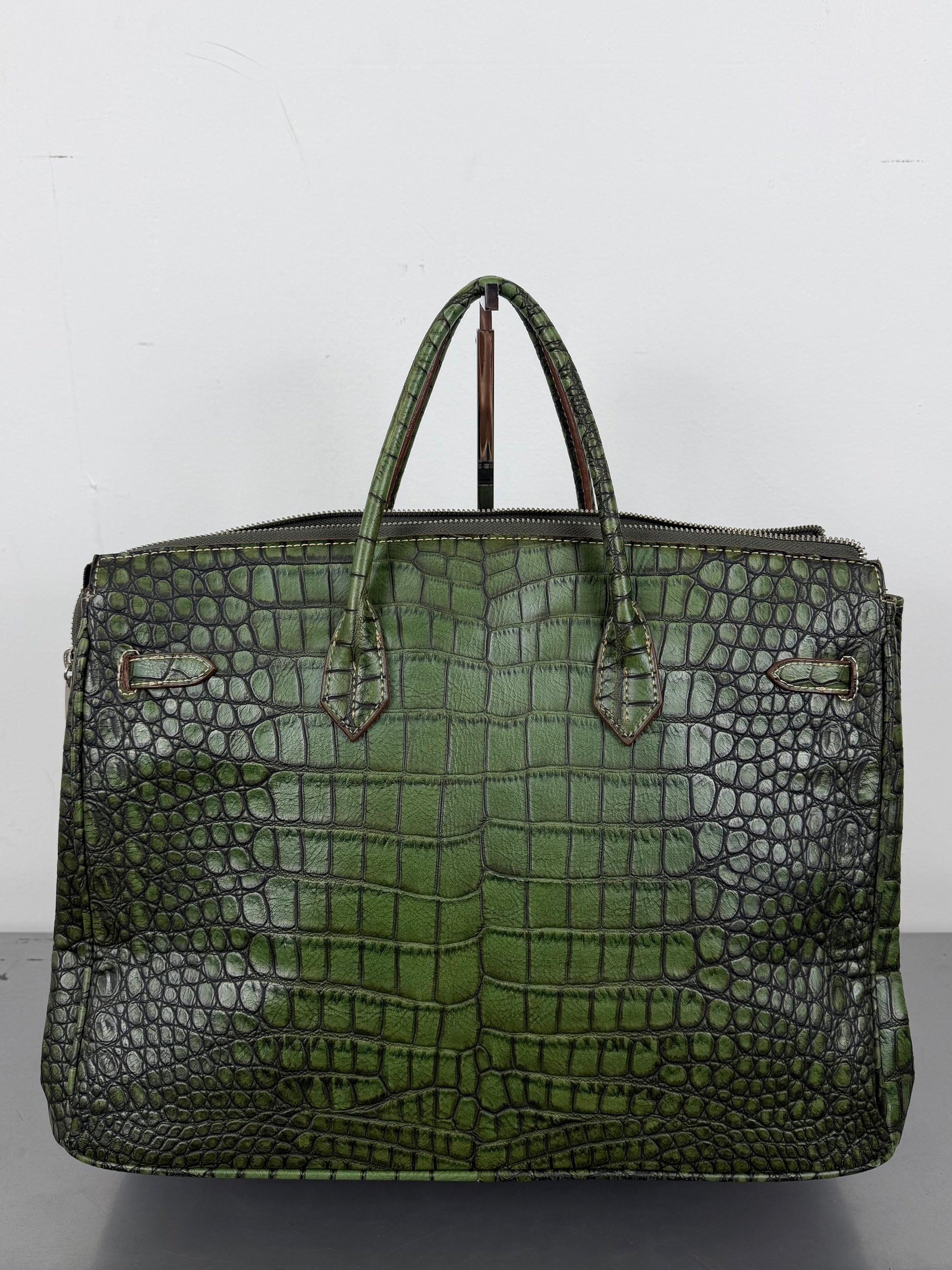 Embossed Animal Print Firkin Handbag