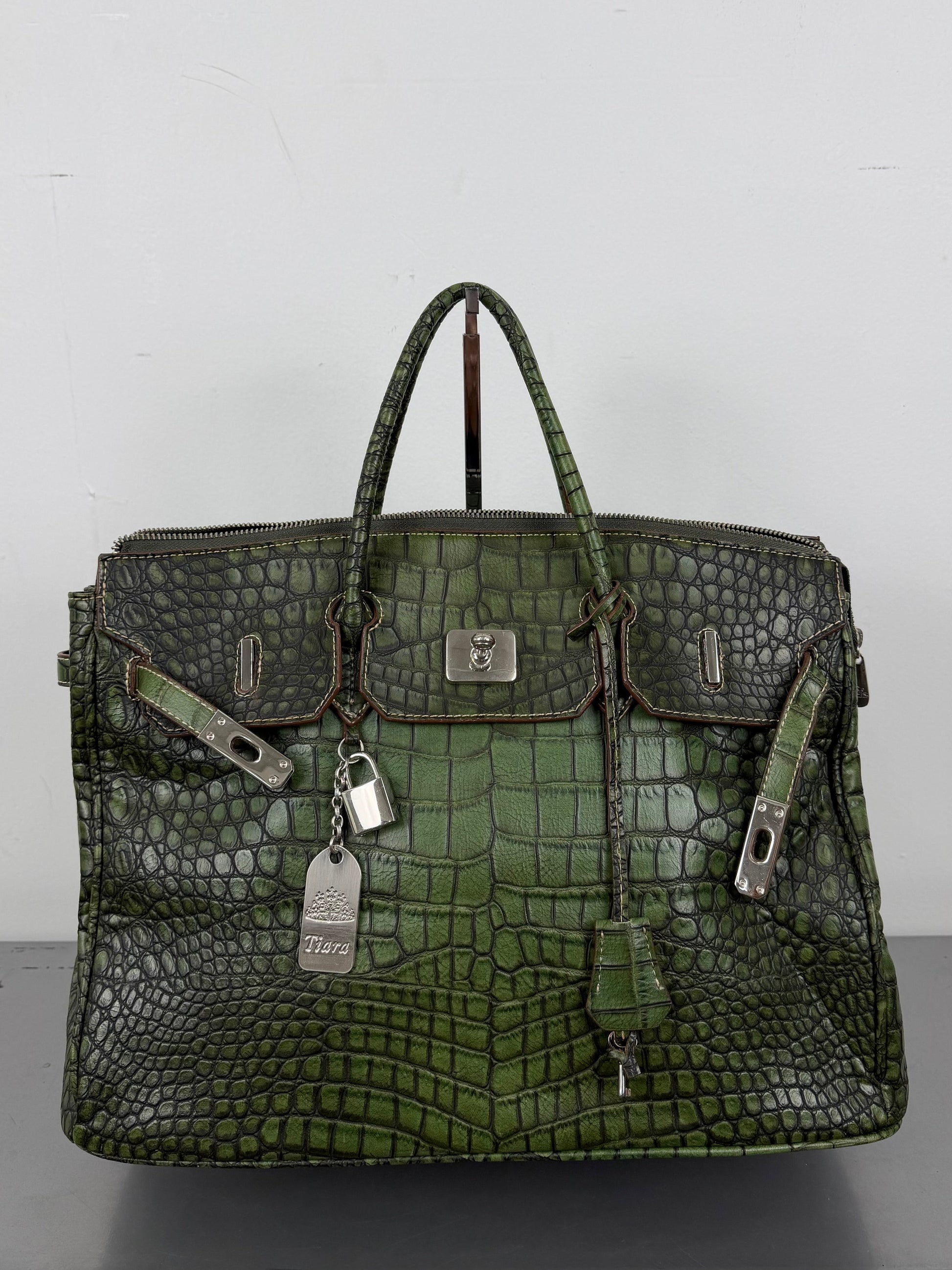 Embossed Animal Print Firkin Handbag